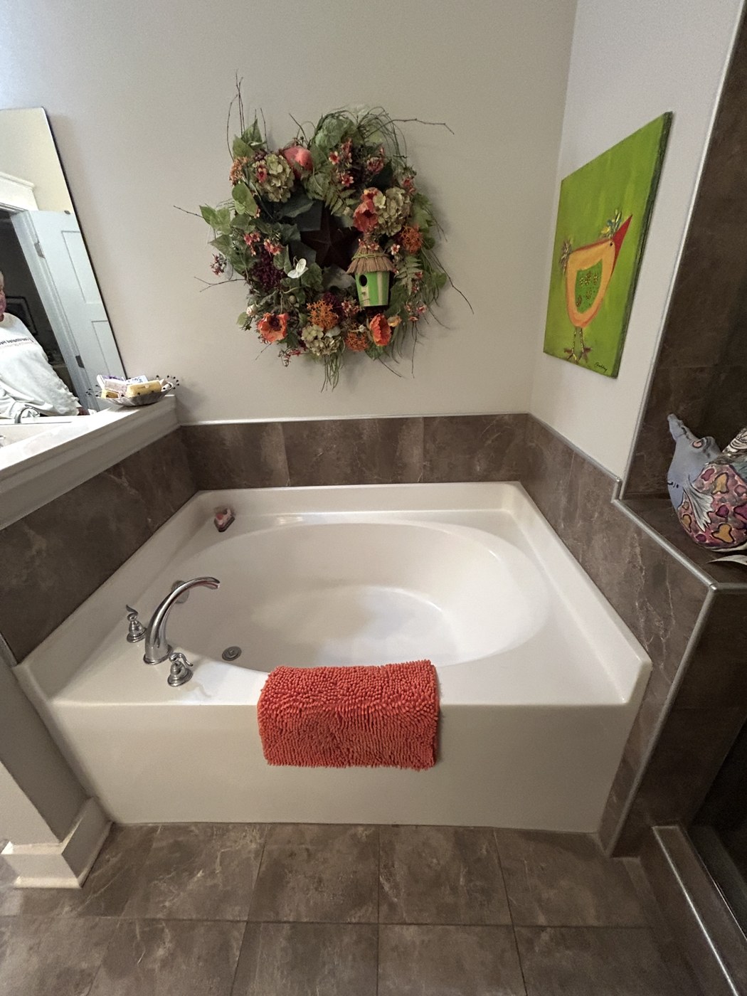 The garden tub in a Taylors first-floor bathroom by Tile Yoda